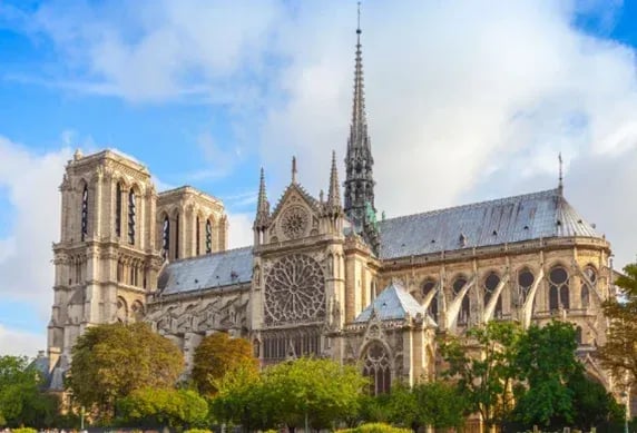 Gothic Notre-Dame Cathedral in Paris featuring flying buttresses and Lutetian limestone architecture