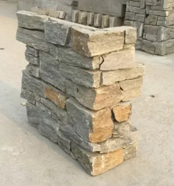 Grey and tan cultured stone veneer corner panel sample for wall cladding